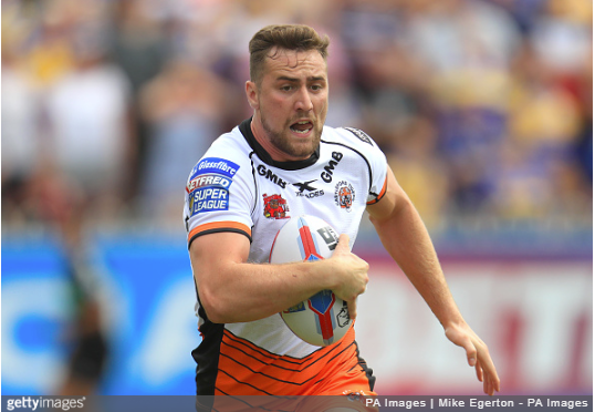 James Clare Giving His All in Wing Battle